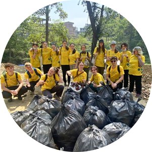 Australian university students volunteer abroad in Nepal, taking Climate Action by doing community cleanups